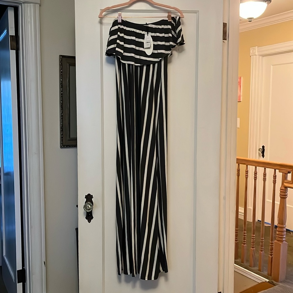 Brand new with the tags on off the shoulder maxi dress.